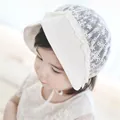 Lace baby sun hat in white with delicate flower embroidery and soft chin strap - Beige Plum Blossom Lace Hat
