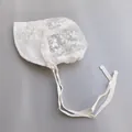 White lace baby bonnet with floral embroidery and adjustable chin straps for newborns - White Bubble Flower Hat