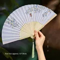 Classic Chinese folding fan with osmanthus patterns and a light green tassel - 70 Golden Osmanthus