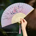 Classic Chinese folding fan in light purple with pink cherry blossom and bamboo ribs - 72 Flowering Branch Dream