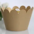 Elegant laser-cut golden cupcake wrapper with pearlescent finish and scalloped edges - Beige Gold