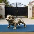 Detailed close-up of antique bronze bulldog figurine with studded collar on blue surface - Large Bully Dog