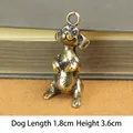 Statuetta di cane pastore in ottone antico con finitura vintage e anello di aggancio - Cane dello Zodiaco Seduto / Bronzo