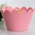Pink scalloped cupcake wrapper with a decorative paper design for parties - Rose Red