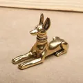 Ancient Egyptian Anubis brass figurine in sitting pose with vintage bronze finish - Pharaoh Hound