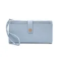 Detail of light blue lychee pattern faux leather wallet with wristlet and snap closure - Litchi Pattern Long Wallet / Sky Blue