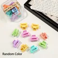 Colorful mini plastic hair claws in macaroon shades stored in a clear gift box - Cube / Spring Colors