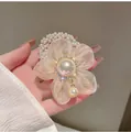 Elegant champagne mesh flower hair scrunchie with large pearl and rhinestone accents - Champagne Pearl Flower