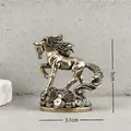 Detailed view of an antique brass galloping horse figurine showing 5cm height dimensions - Horse Chasing Fortune