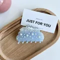 Cloud-shaped light blue acetate hair claw clip with elegant white pearl embellishments - Pearl Cloud Style / Light Blue