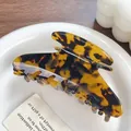 Elegant large tortoiseshell acetate hair claw clip in classic yellow and black pattern - Coffee Tortoise Shell