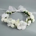 Elegant white floral bridal wreath with faux roses, pearls, and a large sheer ribbon tie - White