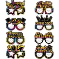 Set mit 8 Happy New Year 2027 Partybrillen aus Gold und Schwarz Deko-Karton - Neujahrs-Papierbrillen Stil C