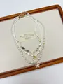 Detailed macro of multi-layer ocean necklace with seashell and starfish pendants - Starfish Shell Multi-Layer Necklace (XL3521A)