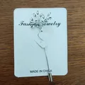 Silver tree shaped brooch with crystal rhinestones on a white display card - Silver Tree Style (Silver Tree)