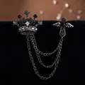 Gothic crown and winged cross brooch set with gunmetal tassel chains and dark rhinestones - Crown Cross / Silver Base Black Rhinestone