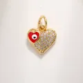Golden heart pendant featuring red evil eye enamel and crystal pavé on 18k gold plated brass - Red Evil Eye Heart