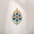 Golden Hamsa Hand pendant with blue enamel star and sparkling white rhinestones - Blue And White Enamel Star Hamsa Hand