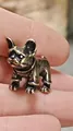 Miniature brass French bulldog figurine shown on a fingertip for size reference - French Bulldog Medium / Bronze