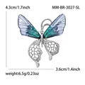 Elegante zilveren vlinderbroche met blauwe gradiënt vleugels en kristallen detail - Blauwgroen (Zilveren Basis)