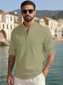 Detail of sage green linen shirt featuring a grandad collar and buttoned sleeve cuffs - Army Green