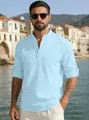 Close-up of breathable light blue linen blend shirt with mandarin collar and button detail - Light Blue