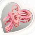 Pince à cheveux papillon dégradé rose et magenta sur un miroir blanc en cœur - Rose foncé dégradé