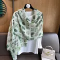 Detail of mint green linen scarf featuring stylish cartoon cat prints and soft texture - 180*90CM / Green