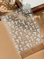 Polka dot bow nail stickers in silver white with glitter finish on clear backing - White Laser Ribbon Bowknot Style (YT7948Te)