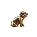 Macro shot of retro brass pig figurine showing vintage metal texture and details - Piggy