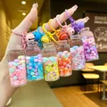 Close-up of 6 colorful drifting bottle keychains with glowing beads and snow sequins - Luminous Snowflake (Colored Hardware) / Lobster Clasp Style / Multicolor