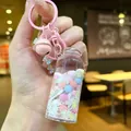 Pink creative drift bottle keychain with colorful bubbles, bells and metal ring - Luminous Snowflake (Colored Hardware) / Lobster Clasp Style / White