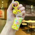 Luminous drift bottle keychain with colorful beads and yellow bell charm - Luminous Snowflake (Colored Hardware) / Lobster Clasp Style / Yellow