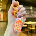 Glow drifting bottle keychain with orange snowflake sequins and multi-colored beads - Luminous Snowflake (Colored Hardware) / Lobster Clasp Style / Orange