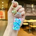 Creative glowing drift bottle keychain with colorful macaron beads and snowflakes - Luminous Snowflake (Gold Hardware) / Lobster Clasp Style / Blue