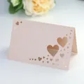 Close-up of pink glitter card with laser-cut heart patterns and pearlescent texture - Jade Pearl