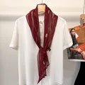 Silk neck scarf with burgundy chain pattern styled on a white shirt collar - Burgundy Chain