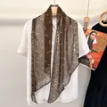 Brown mulberry silk skinny scarf with white paisley pattern over a white shirt - Brown Coffee Paisley