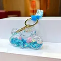 Porte-clés moto sable mouvant avec lanière bleue et paillettes roses brillantes - Moto En Corde Florale Bleue Et Flocon De Neige Lumineux