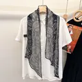 100% mulberry silk skinny scarf with black paisley pattern on white shirt collar - Black and White Paisley