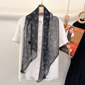 Long silk scarf in dark paisley and floral print with red and blue ethnic style borders - Navy Blue Floral