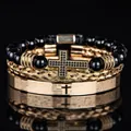 Golden 3-piece set featuring cross charm bead bracelet and engraved metal bangles - Beaded Cross Gold Set