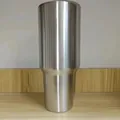 Sleek silver 40oz stainless steel insulated travel tumbler with a brushed metal finish - 40oz / Steel Color