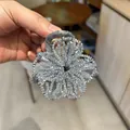 Elegant floral hair claw clip in silver grey crystals with woven petal design and silk wrap - Rose Blue