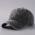 Unisex washed dark grey baseball cap featuring a detailed turtle embroidery pattern - One Size / Black
