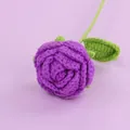 Handmade crochet rose flower in deep purple yarn with green leaves on purple background - Large Rose Bouquet / Deep purple