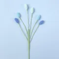 Handmade crochet rose branch featuring six gradient blue knitted flowers on a green stem - 6-Head Bell Fruit Stem / Gradient Blue