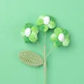 Handmade crochet flower with three white and green blossoms on a textured knit stem - Snow Five 3-Head Puff Flower Branch / Gradient Green