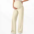 Detail of high waist maternity wide leg pants in beige with elastic belly support band - Off White
