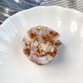Conch shell acetate hair claw clip with tortoise pattern and gold spiral accents - Coffee Candy